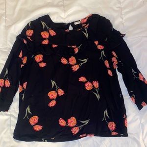 Medium black and pink floral blouse. Used but good condition.